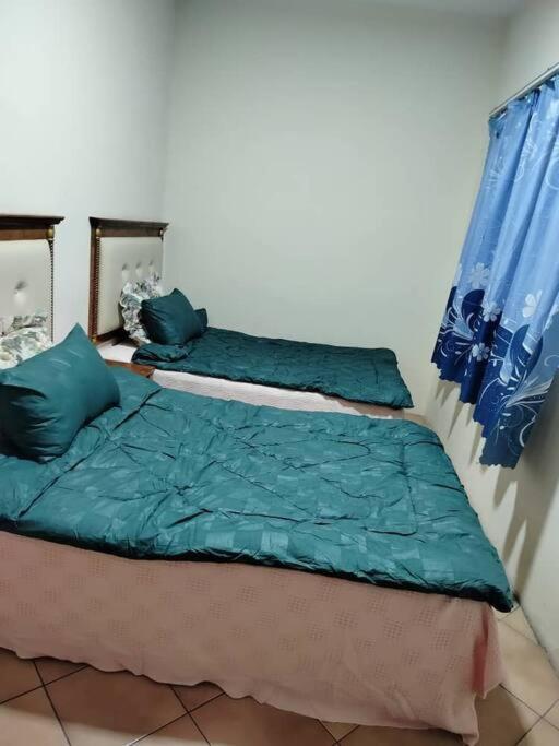 Homestay Elina - Cheap And Cosy Port Dickson Ngoại thất bức ảnh